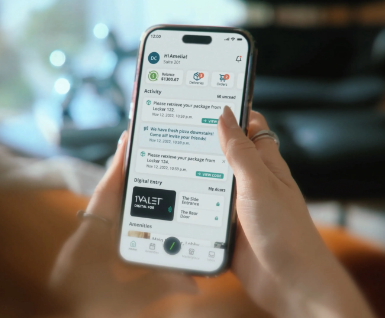 Téléphone affichant l’application 1VALET, qui simplifie l’accès à l’immeuble et aux services résidentiels